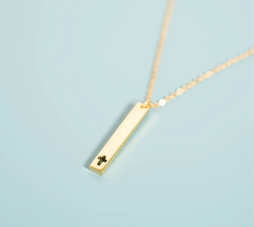 gold vertical bar cross necklace dainty